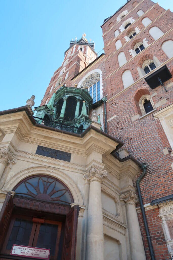 St Marys Basilica main entrance porch and brick towers in Krakow
