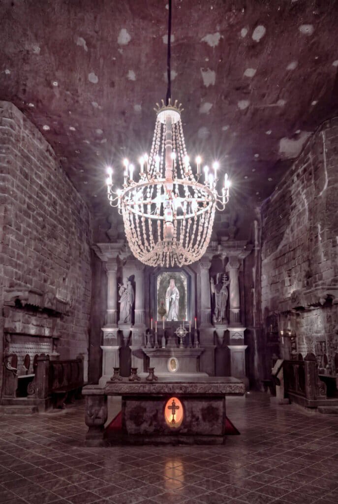 St Kinga's Chapel salt altar and chandelier inside Wieliczka Salt Mine.